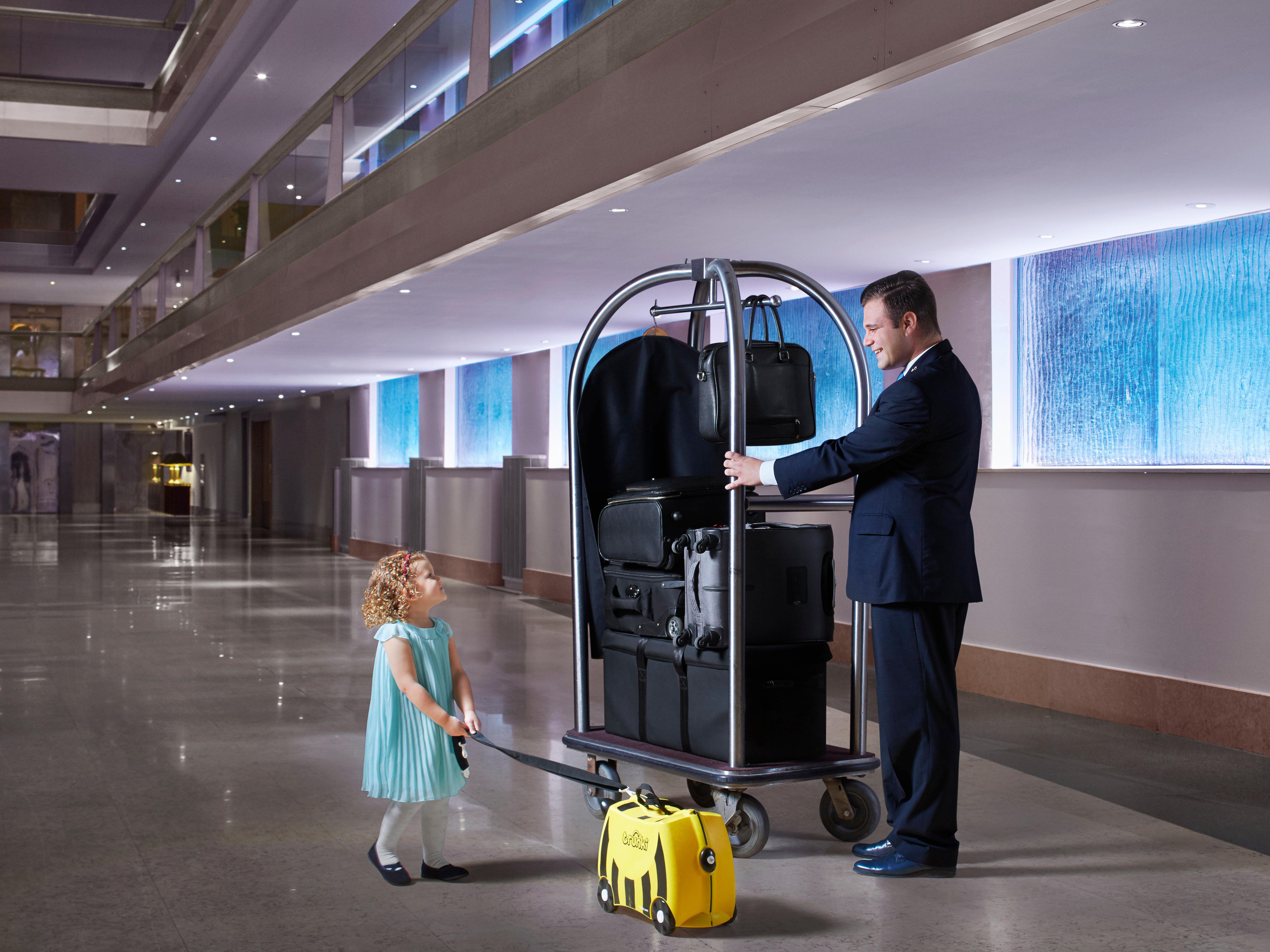 Intercontinental Malta By Ihg Hotel Saint Julian's Bagian luar foto A bellboy with a luggage cart